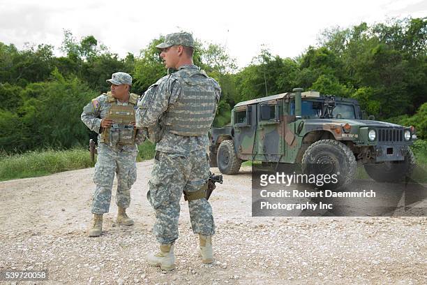 National Guard troops do a shift change on the Rio Grande levee near Anzalduas Park in Granjeno, TX south of Mission in Hidalgo County. Texas...