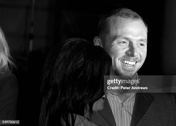 Simon Pegg and hia wife Maureen McCann arrives at the world premiere of "Hot Fuzz" and the Vue Cinema, Leicester Square.