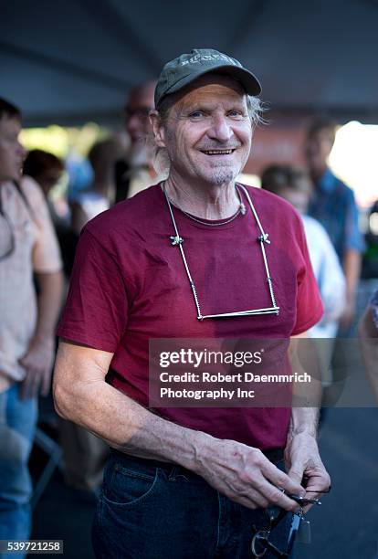 Texas musician Butch Hancock one of the west Texas natives in The Flatlanders, hangs out at the music tent after performing at the 19th annual Texas...