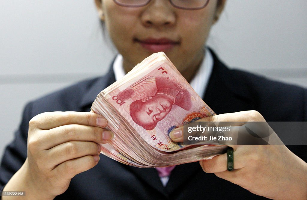 IMF agrees to include China's RMB in benchmark SDR currency basket