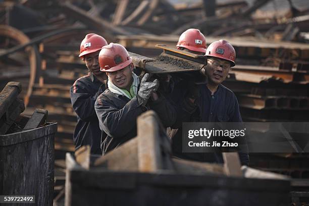 Portraits of Chinese coal miners at a coal in Huaibei, Anhui province, east China on 21th November 2015.