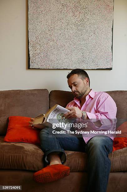 Massimo Bianchi, chef with Buon Ricordo restaurant, Paddington, at home reading the Italian cookbook, Il Cucchiaio D'Argento, 27 October 2005. SMH...