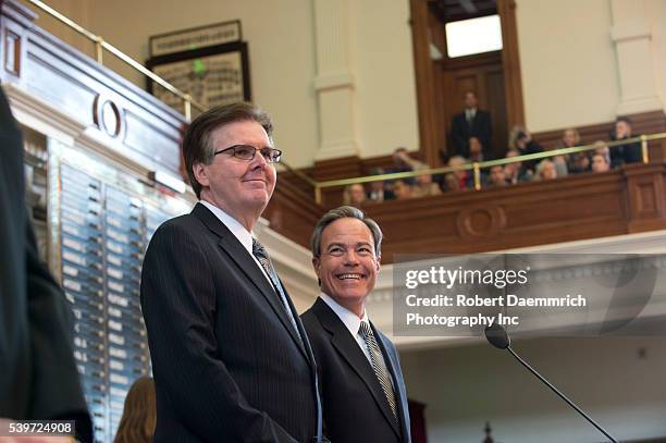 Texas Lt. Governor Dan Patrick, l, and House Speaker Joe Straus in the chamber as Gov. Greg Abbott gives his first State of the State speech since...
