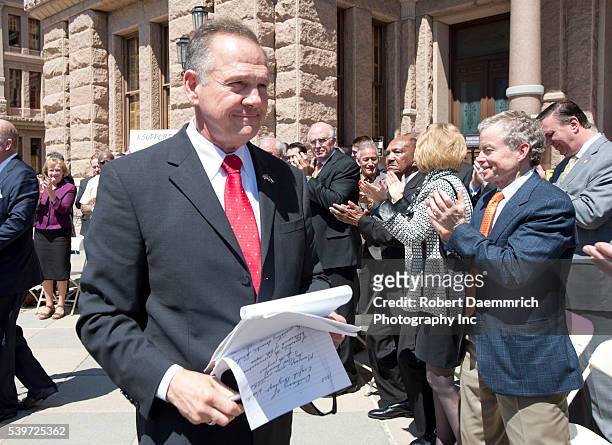 Controversial Alabama Supreme Court Chief Justice Roy Moore speaks at a rally of conservative Texas legislators opposing gay marriage at a Texas...