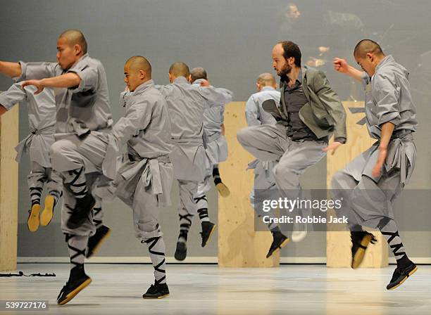 Sidi Larbi Cherkaoui and monks from the Shaolin Temple perform in Sidi Larbi Cherkaoui and Antony Gormley's production of "Sutra" at Sadlers Wells in...