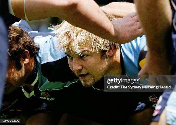 The NSW Waratahs were having a training session at Aussie Stadium. Benn Robinson packs into the scrum at training, 2 February 2006. SMH Picture by...