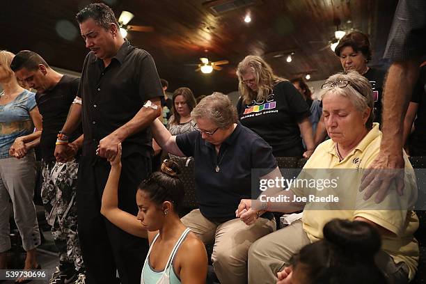 Orlando who was injured in the mass shooting at the Pulse Nightclub attends a memorial service at the Joy MCC Church for the victims of the terror...