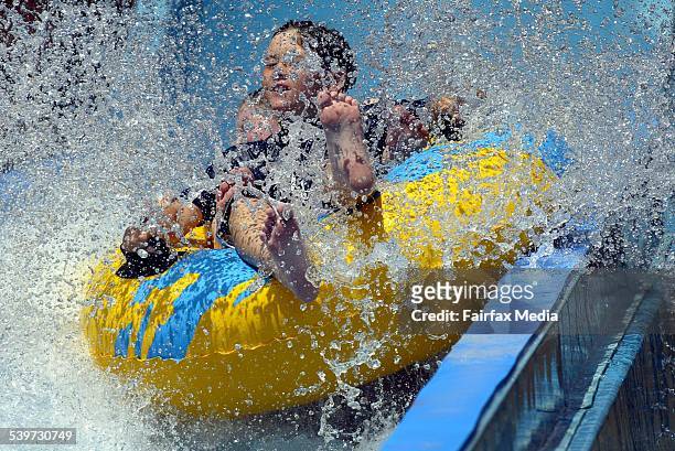 Visitors at Wet 'n Wild on the Gold Coast splash down the water slides, 17 December 2004. AFR Picture by ROBERT ROUGH