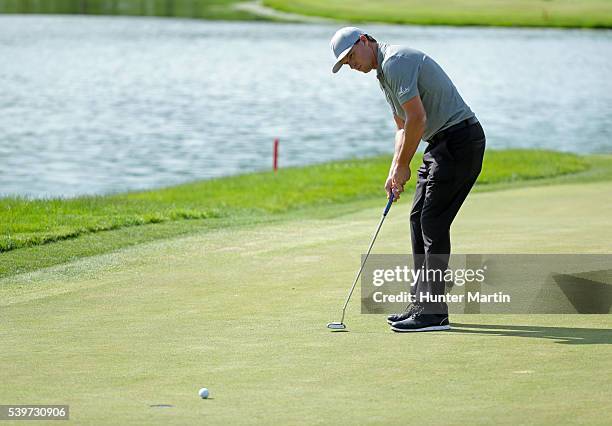 John Mallinger putts for birdie on the 18th hole during the final round of the Web.com Tour Rust-Oleum Championship at the Ivanhoe Club on June 12,...