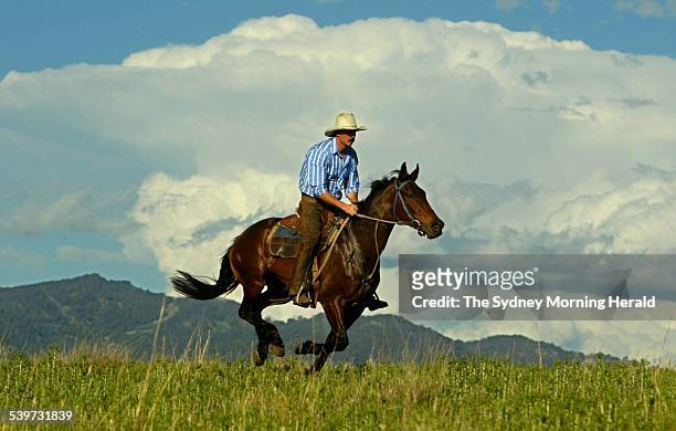 Spring Carnival 2005. Horse trainer, Greg Bennett, during conditioning work on racehorse Donna Uccello on his property in Middlebrook near Scone in...