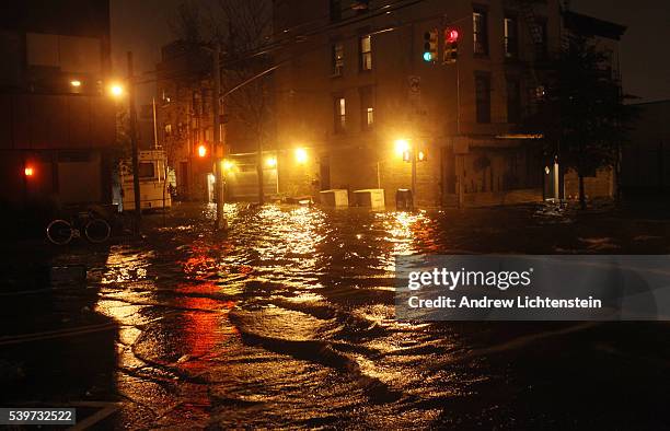 Hurricane Sandy bears down on Brooklyn, New York. A tidal surge pushes the Gowanus Canal into the streets of Brooklyn.