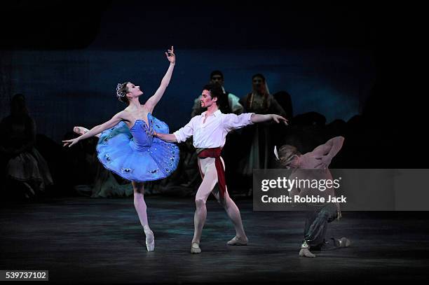 Irina Dvorovenko as Medora,Cory Stearns as Conrad and Ethan Stiefel as Ali with artists of the company in American Ballet Theatre's production of "Le...