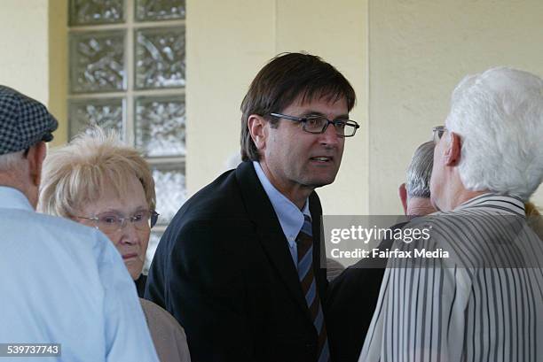 Head of ACTU Greg Combet talking to Elaine Brennan at the funeral of her late husband, Former Union Boss John Brennan at Newcastle Crematorium...