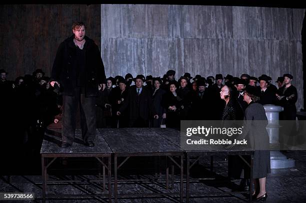 Stuart Skelton as Peter Grimes, Amanda Roocroft as Ellen Orford and Felicity Palmer as Mrs Sedley with artists of the company in the English National...