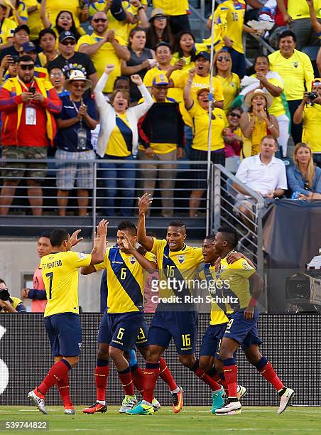Antonio Valencia of Ecuador celebrates with teammates after scoring the fourth goal of his team during a group B match between Ecuador and Haiti at...
