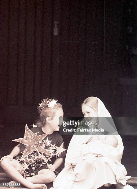 Mother Mary with the Star of Bethlehem - Danielle Benecke of Mosman who plays the star of Bethlehem, pictured with Philippa Johnston of Mosman who is...