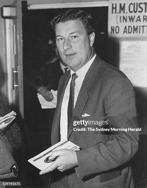 One of the world's leading golfers, Peter Thomson, passes through Sydney Airport on his way from New Zealand to Adelaide, 28 October 1962. SMH...