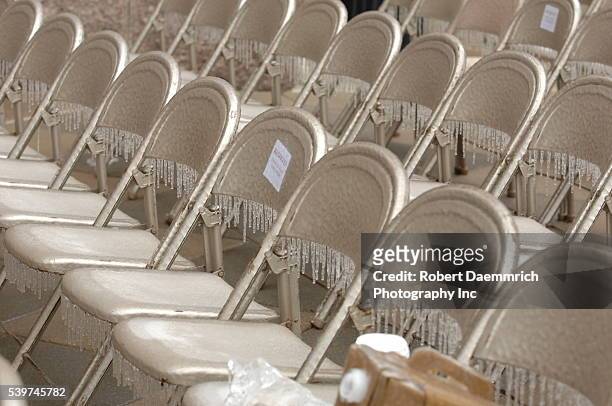 Chairs set up for the outdoor inaugural ceremony Texas Governor Rick Perry and Lt. Governor David Dewhurst ceremony are covered in layers of ice. A...
