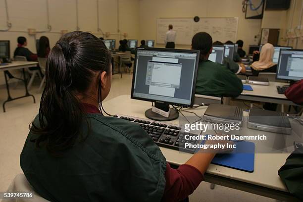 Children of alien families in a computer class at the T. Don Hutto Residential Center in Taylor, Texas. The center, an Immigration and Customs...