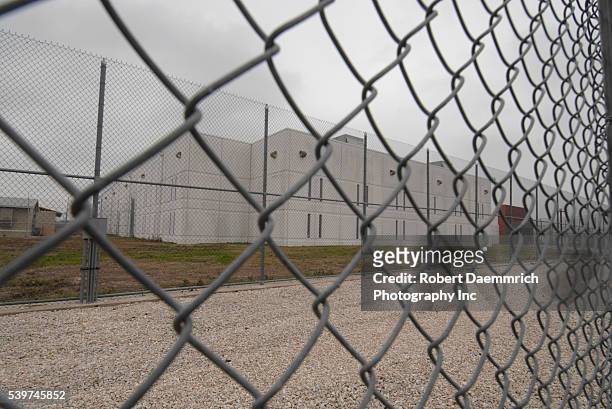 The perimieter fence of the T. Don Hutto Detention facility of the Immigration and Customs Enforcement center for illegal immigrant families.