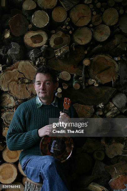 Noel Crombie, former drummer with Split Enz is holding a "Biscalele" which he plays on 1st July, 2005. THE AGE METRO Picture by NEIL NEWITT.