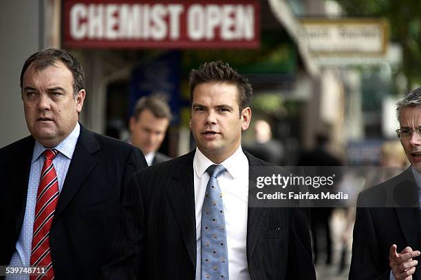 Lachlan Murdoch arrives with his legal team at the supreme court to give evidence regarding the One.Tel hearing, 22 October 2005. AFR Picture by ROB...