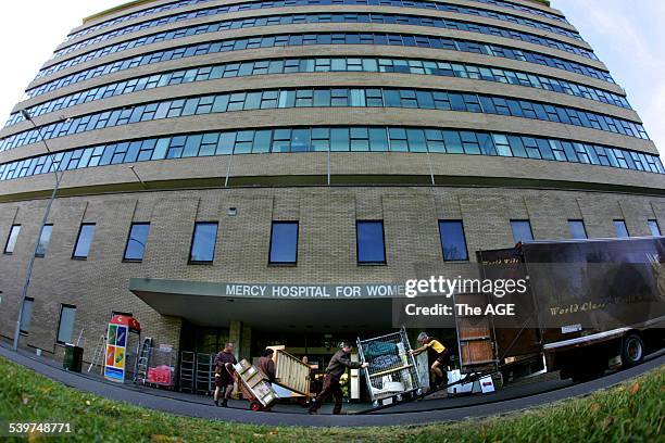 Team of removalists work on the huge task of moving everything from the old to the new Mercy Hospital on 5th September, 2005. THE AGE NEWS Picture by...