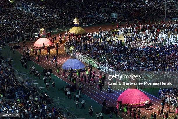 Giant kewpie dolls enter the centre arena during the closing ceremony for the Sydney Olympic Games, 1 October 2000. SMH Picture by NARELLE AUTIO