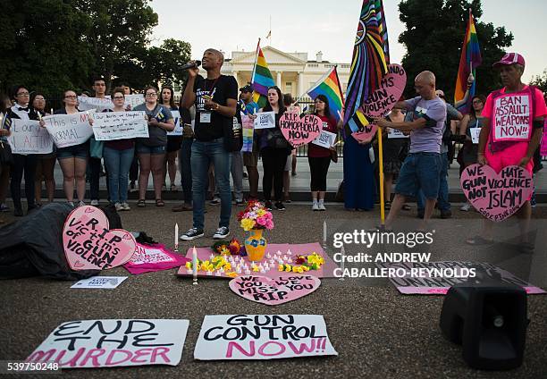 Mourner speaks during a vigil in Washington, DC on June 12 in reaction to the mass shooting at a gay nightclub in Orlando, Florida. Fifty people died...
