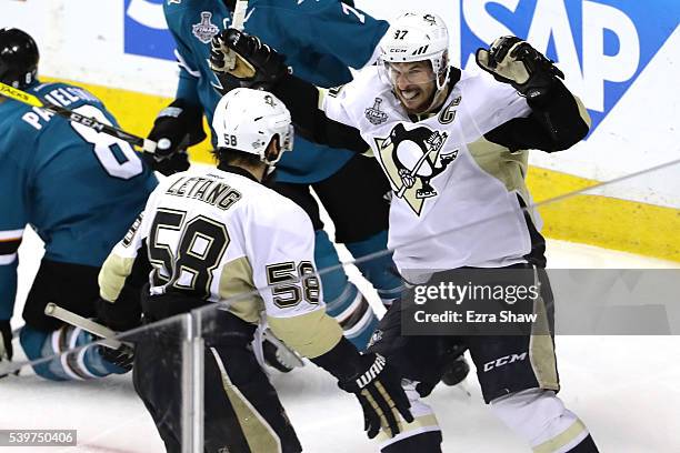 Kris Letang of the Pittsburgh Penguins celebrates his goal in the second period with Sidney Crosby in Game Six of the 2016 NHL Stanley Cup Final at...