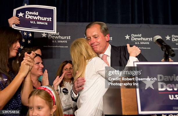 Senate candidate David Dewhurst takes the podium to concede a bitterly fought Republican race with Ted Cruz to replace outgoing Sen. Kay Bailey...
