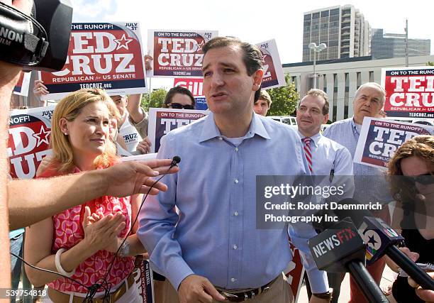 Tea Party favorite Ted Cruz of Houston talks to the press outside a Houston-area polling place prior to his upset victory of Texas Lt. Governor David...