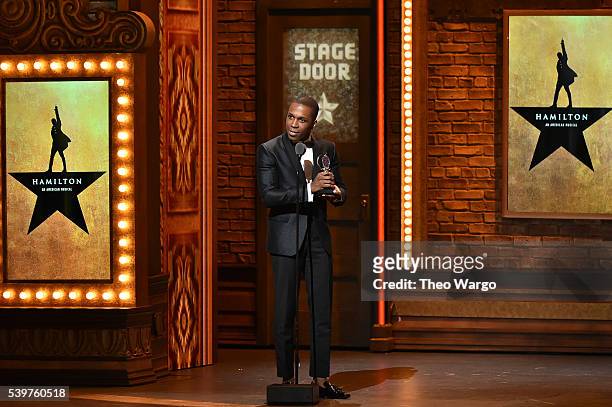 Actor Leslie Odom accepts the award for Best Performance by an Actor in a Leading Role in a Musical in "Hamilton" onstage during the 70th Annual Tony...