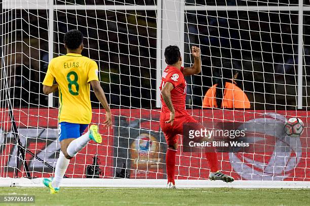 Raúl Ruidíaz of Peru scores the opening goal during a group B match between Brazil and Peru at Gillette Stadium as part of Copa America Centenario US...