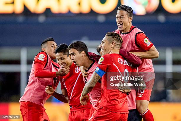 Raúl Ruidíaz of Peru celebrates with teammates after winning a group B match between Brazil and Peru at Gillette Stadium as part of Copa America...