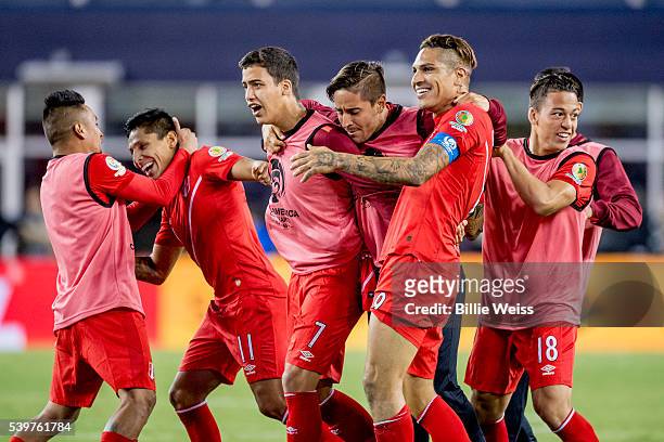 Raúl Ruidíaz of Peru celebrates with teammates after winning a group B match between Brazil and Peru at Gillette Stadium as part of Copa America...