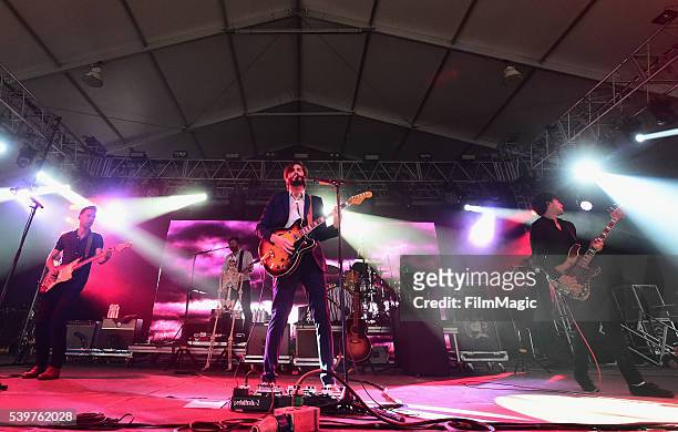 Recording artists Tom Renaud, Brandon Walters, Ben Schneider, Mark Barry, and Miguel Briseno of Lord Huron performs onstage at This Tent during Day 4...