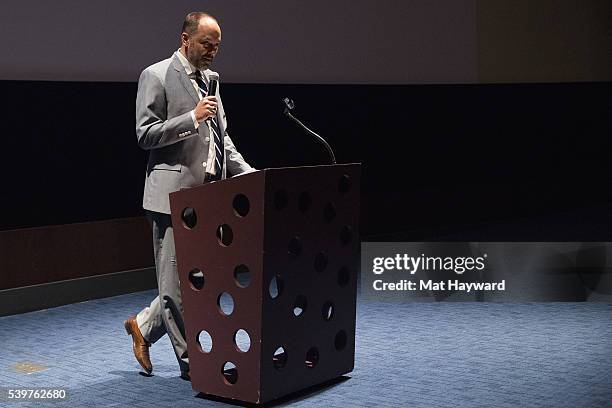 Festival Director and Chief Curator Carl Spence speaks during the SIFF closing night screening of her film "The Dressmaker" at Cinerama on June 12,...