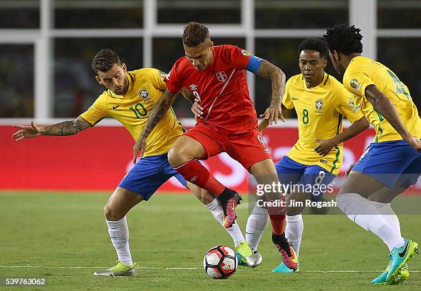Andy Polo of Peru is stopped by Lucas Lima of Brazil during the 2016 Copa America Centenario Group B match between Brazil and Peru at Gillette...