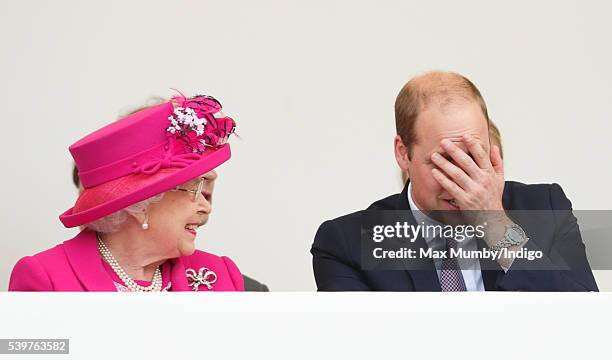 Queen Elizabeth II and Prince William, Duke of Cambridge watch a carnival parade as they attend 'The Patron's Lunch' celebrations to mark Queen...