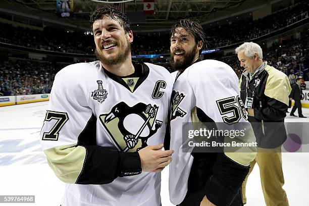 Sidney Crosby and Kris Letang of the Pittsburgh Penguins celebrate after their 3-1 victory to win the Stanley Cup against the San Jose Sharks in Game...