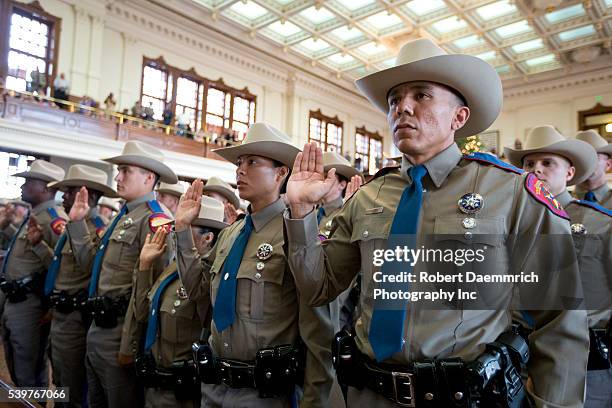 Texas Department of Public Safety commissions a class of 74 new state troopers at the Texas Capitol following 21 weeks of training in...