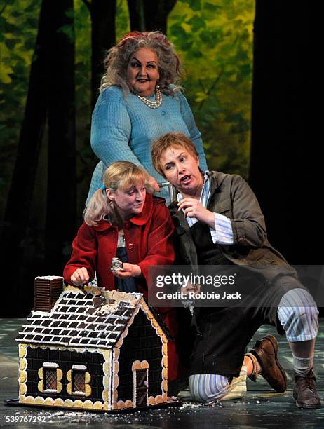 Jane Henschel as Witch, Ailish Tynan as Gretel and Christine Rice as Hansel in the Royal Opera's production of Engelbert Humperdinck's " Hansel Und...