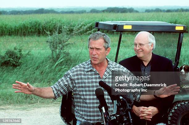 Texas Governor and Republican Presidential Candidate, George W. Bush, along with Vice-Presidential candidate Dick Cheney, speaks to the media at the...