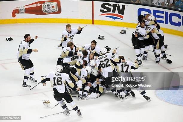 The Pittsburgh Penguins celebrate winning the Stanley Cup against the San Jose Sharks in Game 6 of the 2016 NHL Stanley Cup Final at SAP Center at...