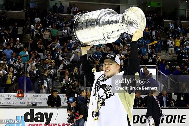 Olli Maatta of the Pittsburgh Penguins celebrates with the Stanley Cup after their 3-1 victory to win the Stanley Cup against the San Jose Sharks in...