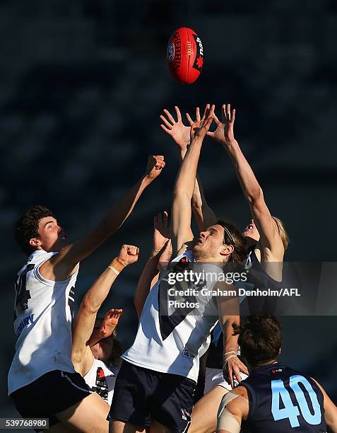 Hunter Clark of Vic Country competes in the air during the Under 18's AFL match between Vic Country and Vic Metro at Simonds Stadium on June 13, 2016...