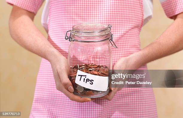 waitress with tips jar - trinkgeld stock-fotos und bilder