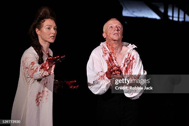 Jonathan Slinger as Macbeth and Aislin McGuckin as Lady Macbeth in the Royal Shakespeare Company's production of William Shakespeare's "Macbeth"...