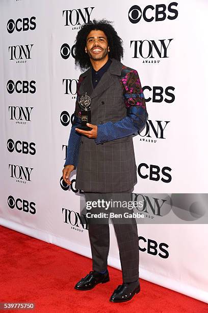 Actor Daveed Diggs poses with the award for Best Performance by a Featured Actor in a Musical during the 70th Annual Tony Awards at The Beacon...